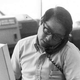 A 1980 photo shows Gordon Sakamoto at work in the UPI bureau in Honolulu . (Sakamoto Family)